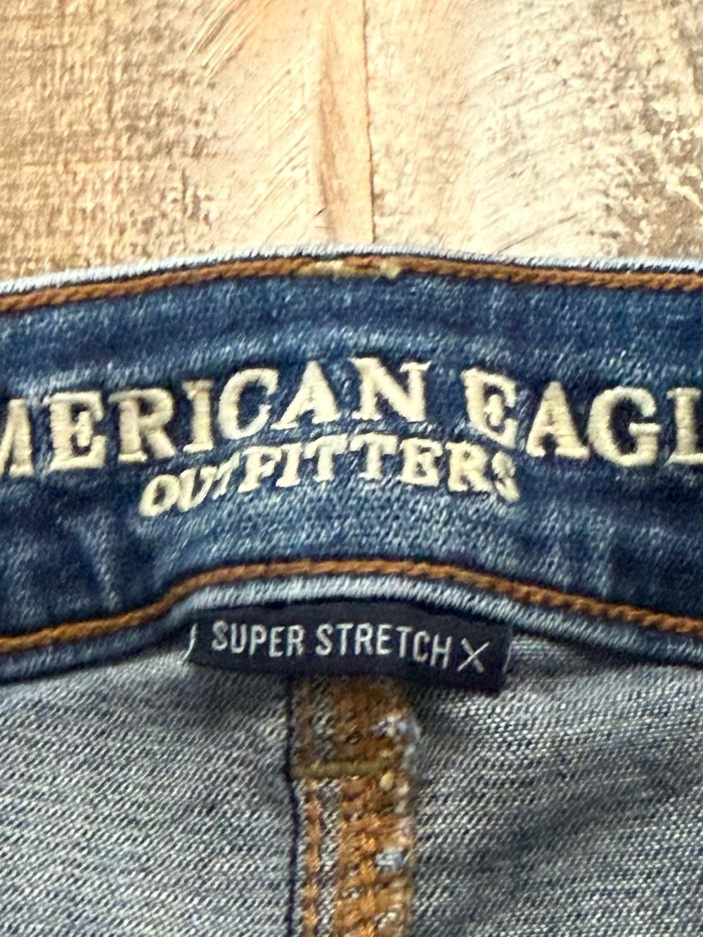 American Eagle Women’s SZ 2 Super Stretch X Distressed Denim Skirt w Raw Hem EUC - Picture 2 of 6